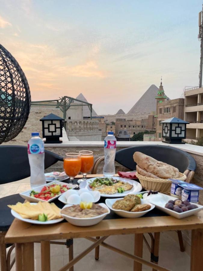 Locanda Pyramids Hotel Kafrat al Jabal ภายนอก รูปภาพ